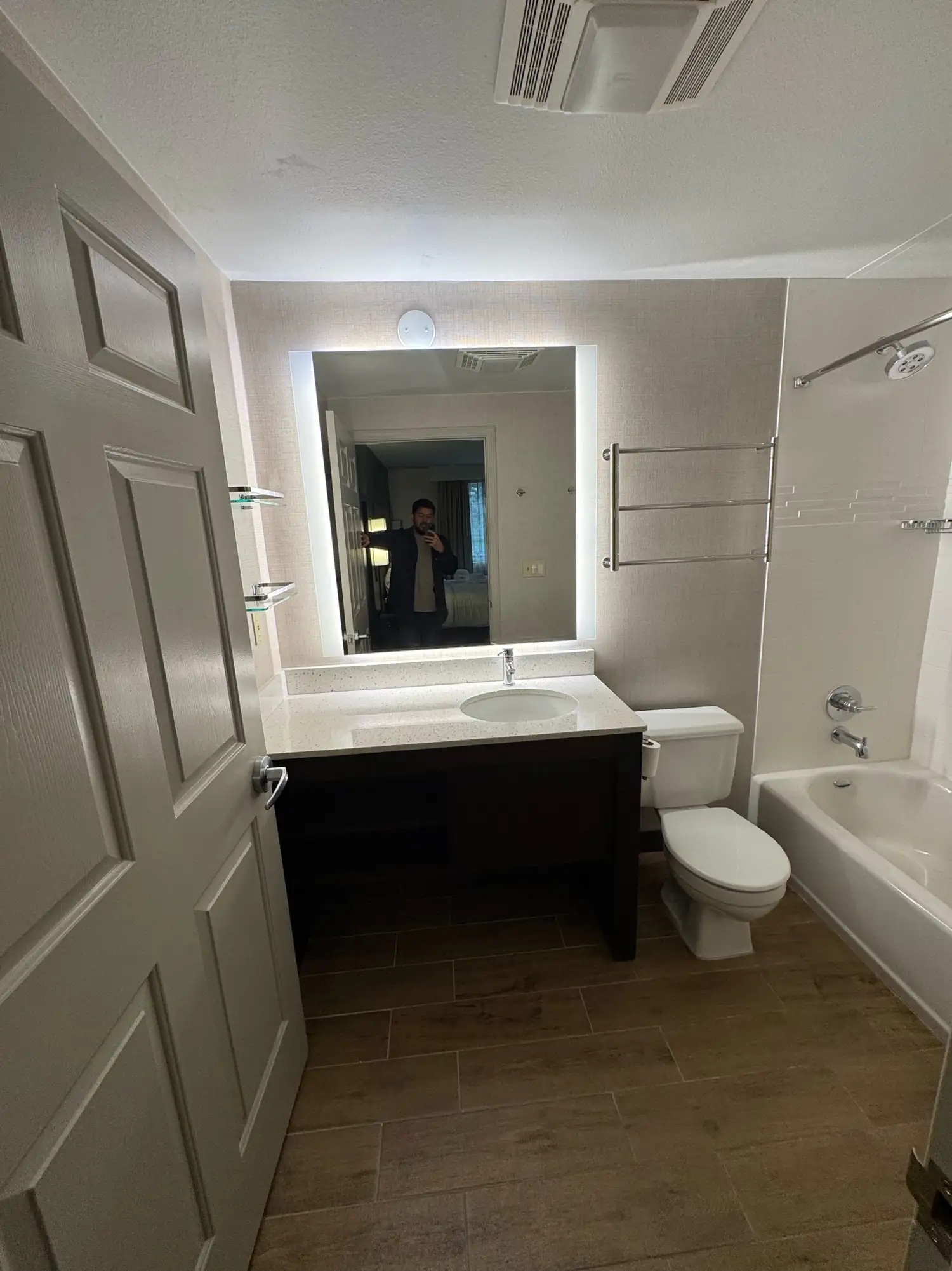 The completed bathroom looking toward the tub and shower