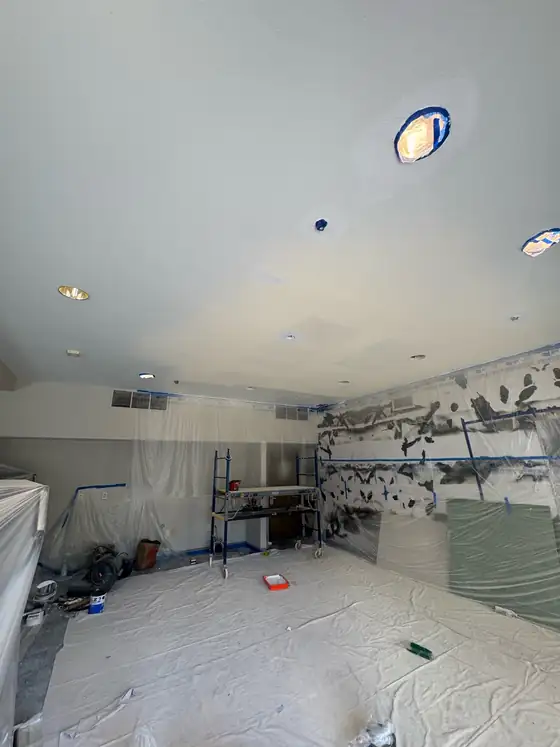 The finished ceiling painted, with the gym being put back together