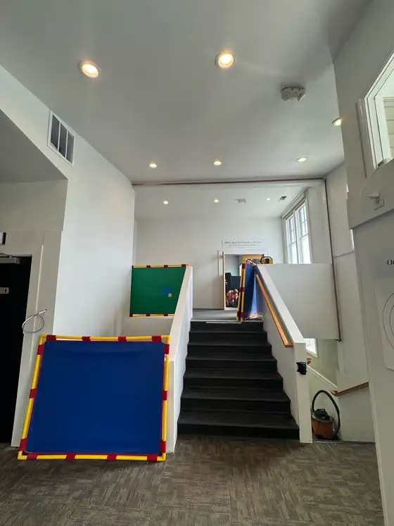 The finished stairwell after drywall and paint