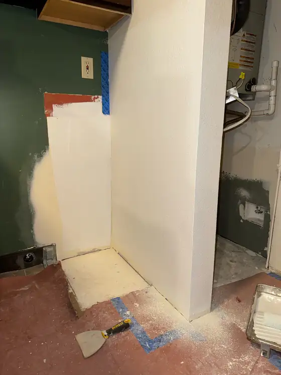 Drywall made good in the alcove with the surrounding finishes protected