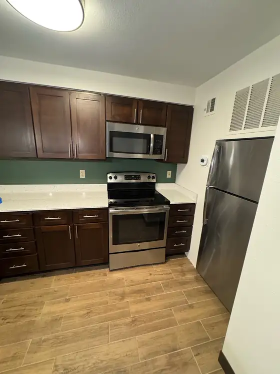 Finished kitchen with the new cabinet, range and refrigerator