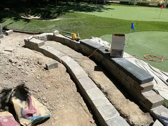 Retaining wall part built, cap stones waiting to go on