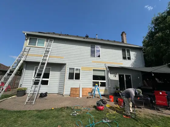 The rear elevation part way through the siding work